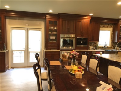 semi custom kitchen cabinet in manhasset hill 1 Golden honey cabinet with walnut island